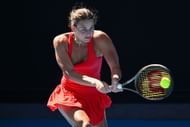 Kostyuk strikes the ball at the 2023 Australian Open - Day 5